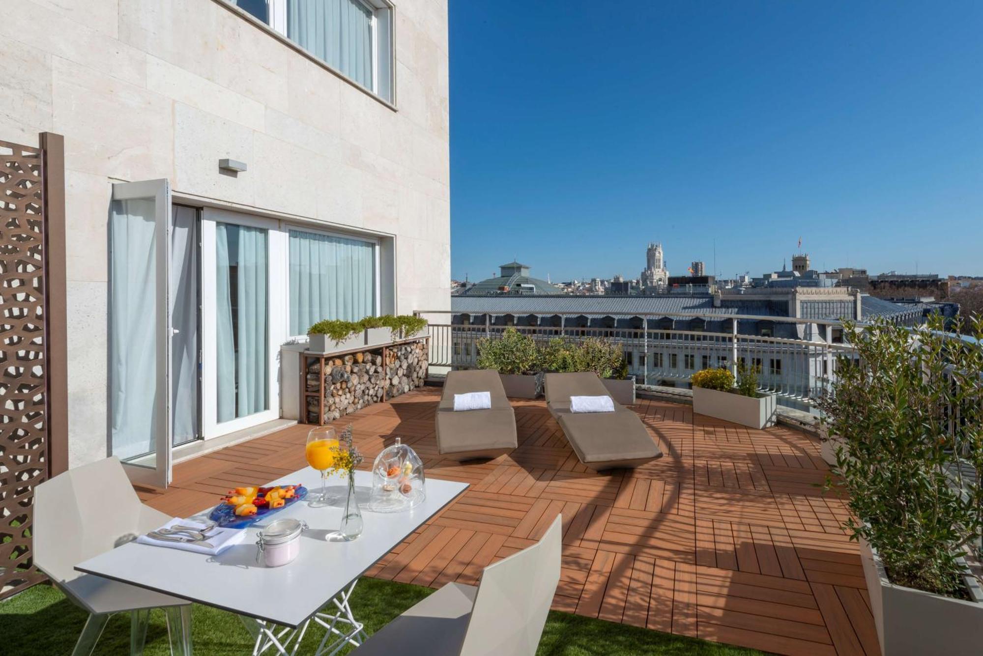 Nh Collection Madrid Suecia Hotel Ngoại thất bức ảnh The hotel's rooftop terrace